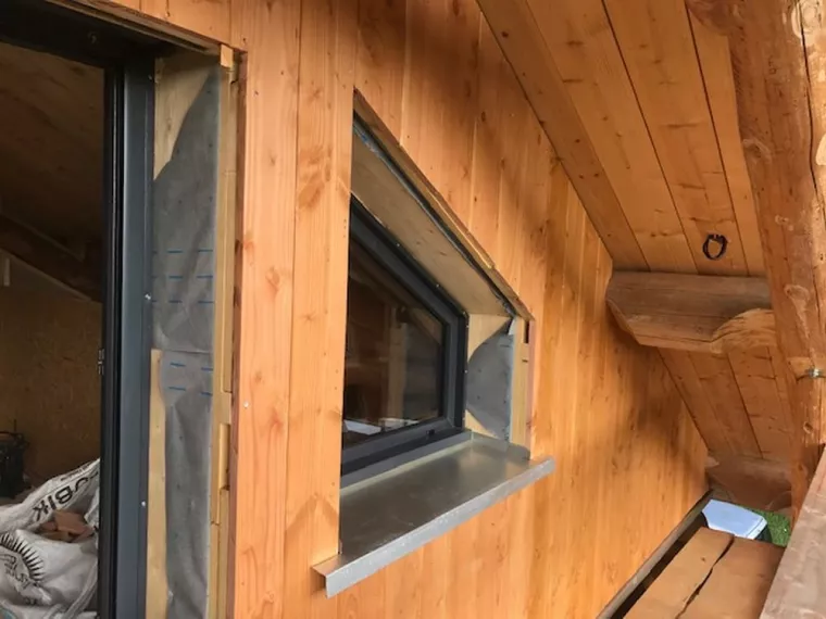 Conception et pose de bardage en bois sur la façade extérieure d'une maison neuve, Gérardmer, Monsieur Gérald XOLIN